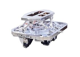 Kundenspezifischer Hexapod entwickelt für EUV-Anwendungen: Die Antriebe (in diesem Fall Elektromotoren) sind außerhalb der EUV-Kammer montiert; innerhalb gibt es nur passive Elemente zur Kraftübertragung.